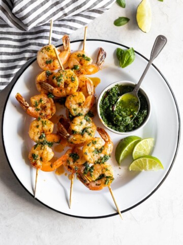 Flavorful, easy-to-make shrimp skewers made with a fresh, homemade basil chimichurri. A great appetizer or main dish ready in less than 15 minutes!