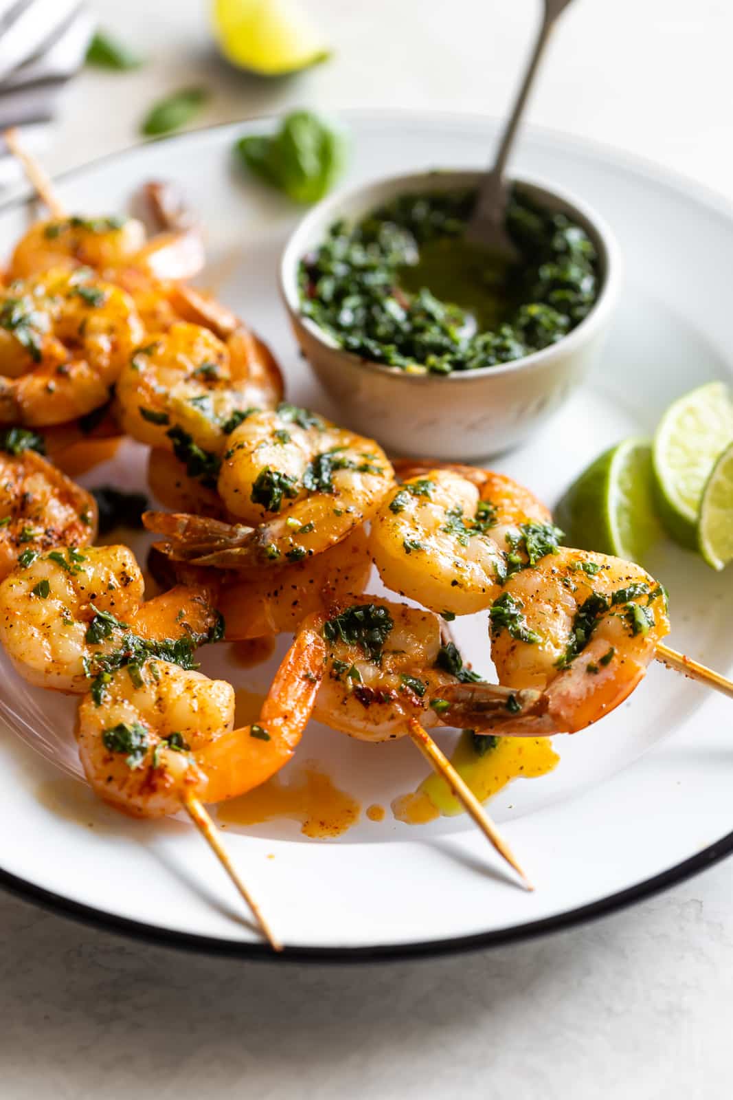 Flavorful, easy-to-make shrimp skewers made with a fresh, homemade basil chimichurri. A great appetizer or main dish ready in less than 15 minutes!