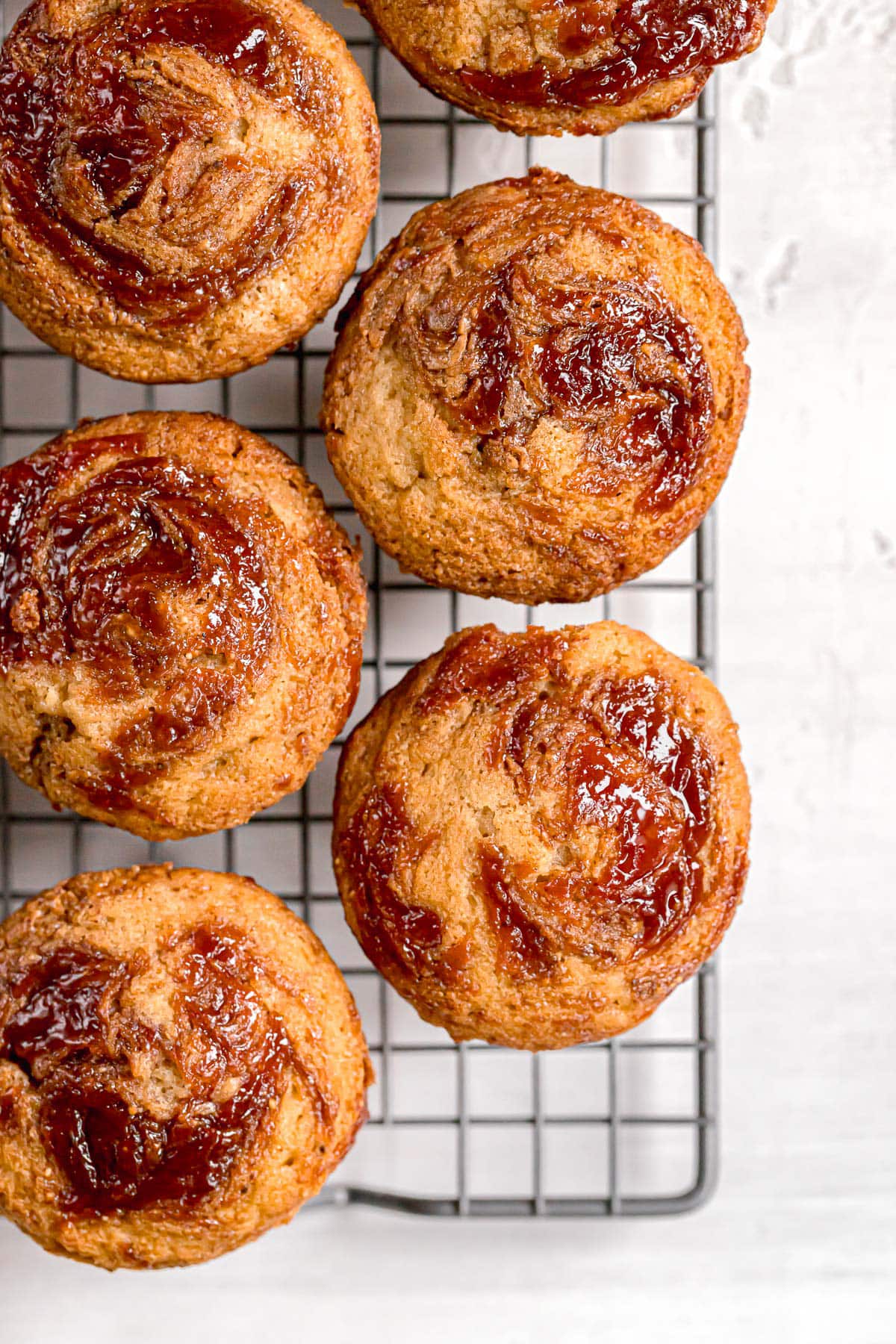 shot of muffins swirled with almond butter and guava jelly on top
