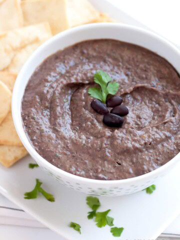 Black bean hummus served in polka-dot bowl