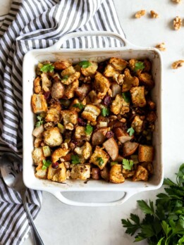 Caramelized Onion Pear & Walnut Stuffing. A flavorful and easy-to-make Thanksgiving stuffing made with caramelized onions, pears, celery, walnuts, and dried cranberries.
