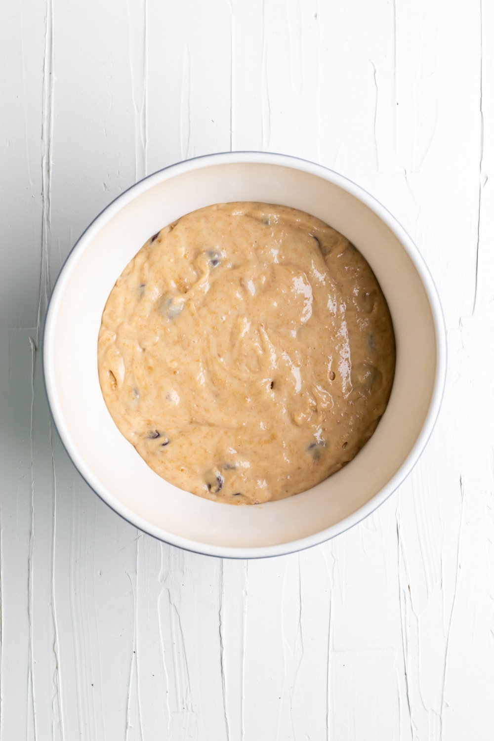 muffin batter with all the ingredients incorporated with chocolate chips