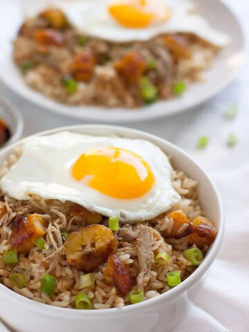 Easy Cuban Pork Fried Brown Rice. Brown rice with Cuban-style pulled pork, chopped sweet plantains, scallions, and a fried egg. An easy 20-minute meal using leftover pulled pork and brown rice!
