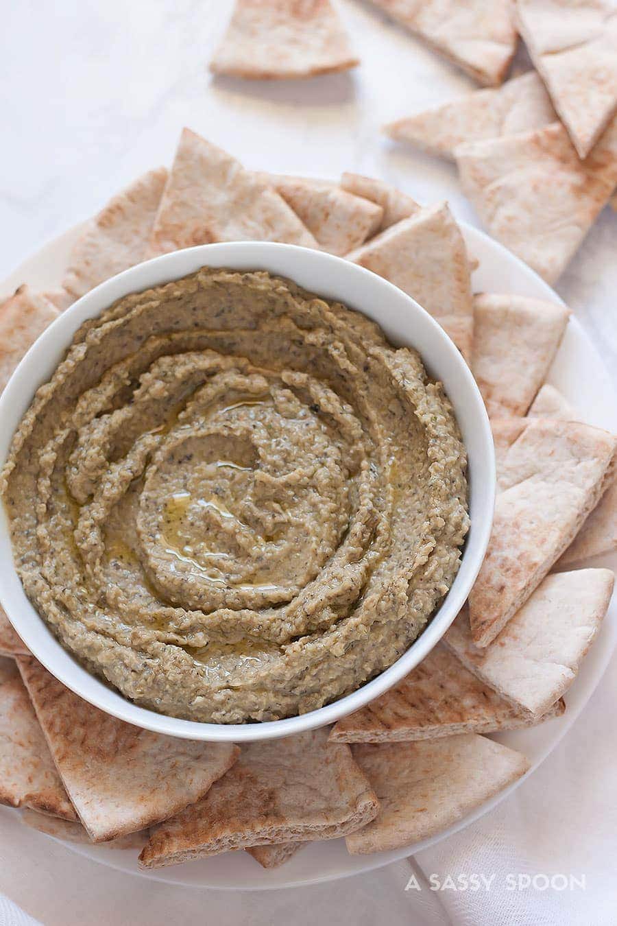 Kalamata olive hummus without tahini! A creamy, boldly flavored hummus made with kalamata olives, garlic, and spices. Perfect snack ready in 5 minutes!