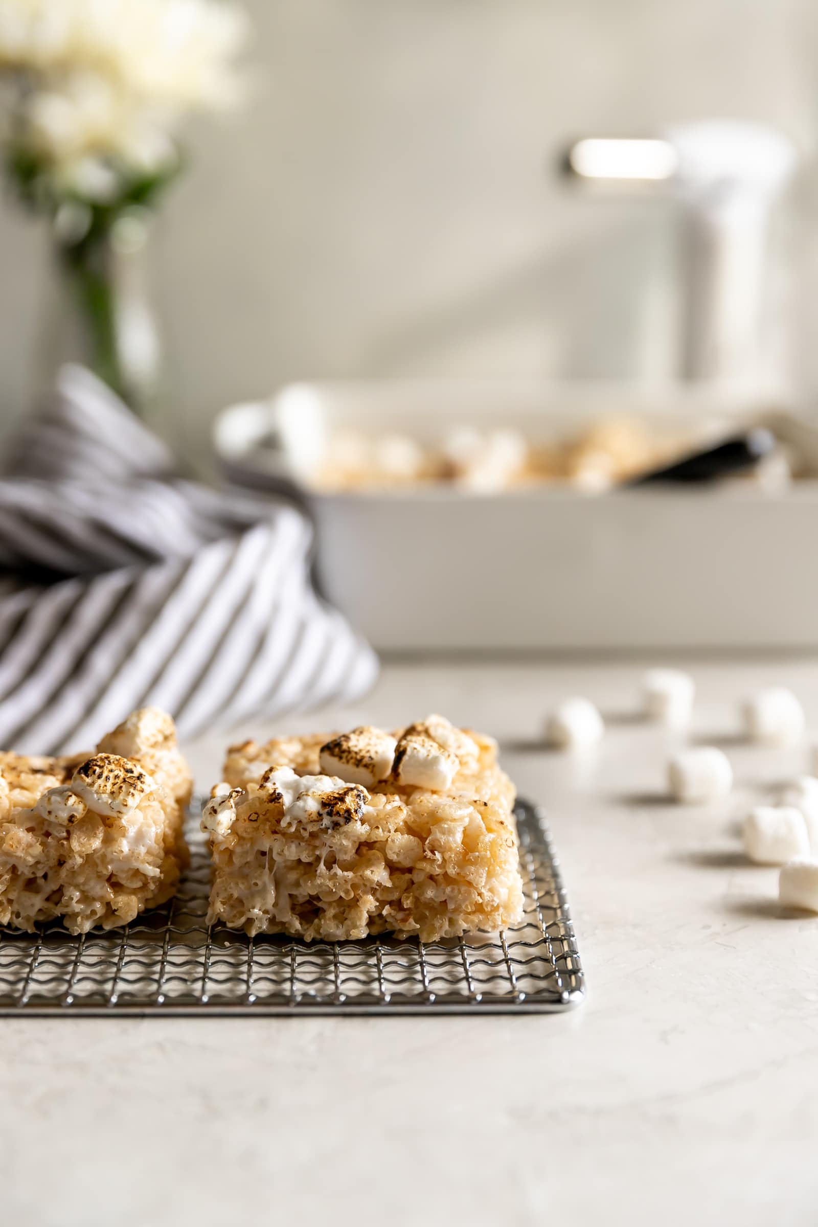 A sweet crispy classic treat with a smoky twist! Rice cereal, torched marshmallows, and smoked almonds come together to make Smoky Rice Krispie Treats.