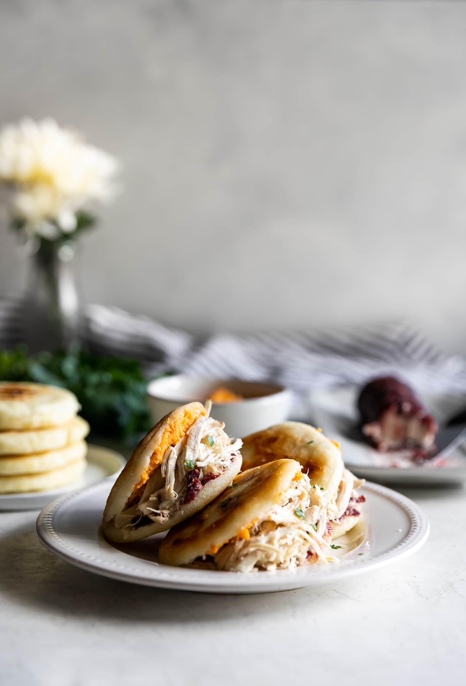 Easy-to-make arepas (pan fried corn cakes) made with homemade cranberry goat cheese and your favorite Thanksgiving leftovers!