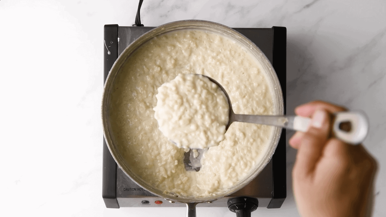 cooking Cuban rice pudding with sweetened condensed milk